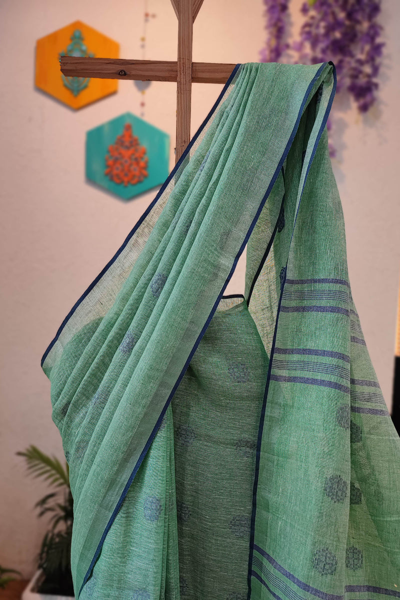 Sea Green Linen Cotton Saree with Woven Buti, Contrast Blue Border & Tassels