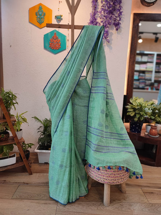 Sea Green Linen Cotton Saree with Woven Buti, Contrast Blue Border & Tassels