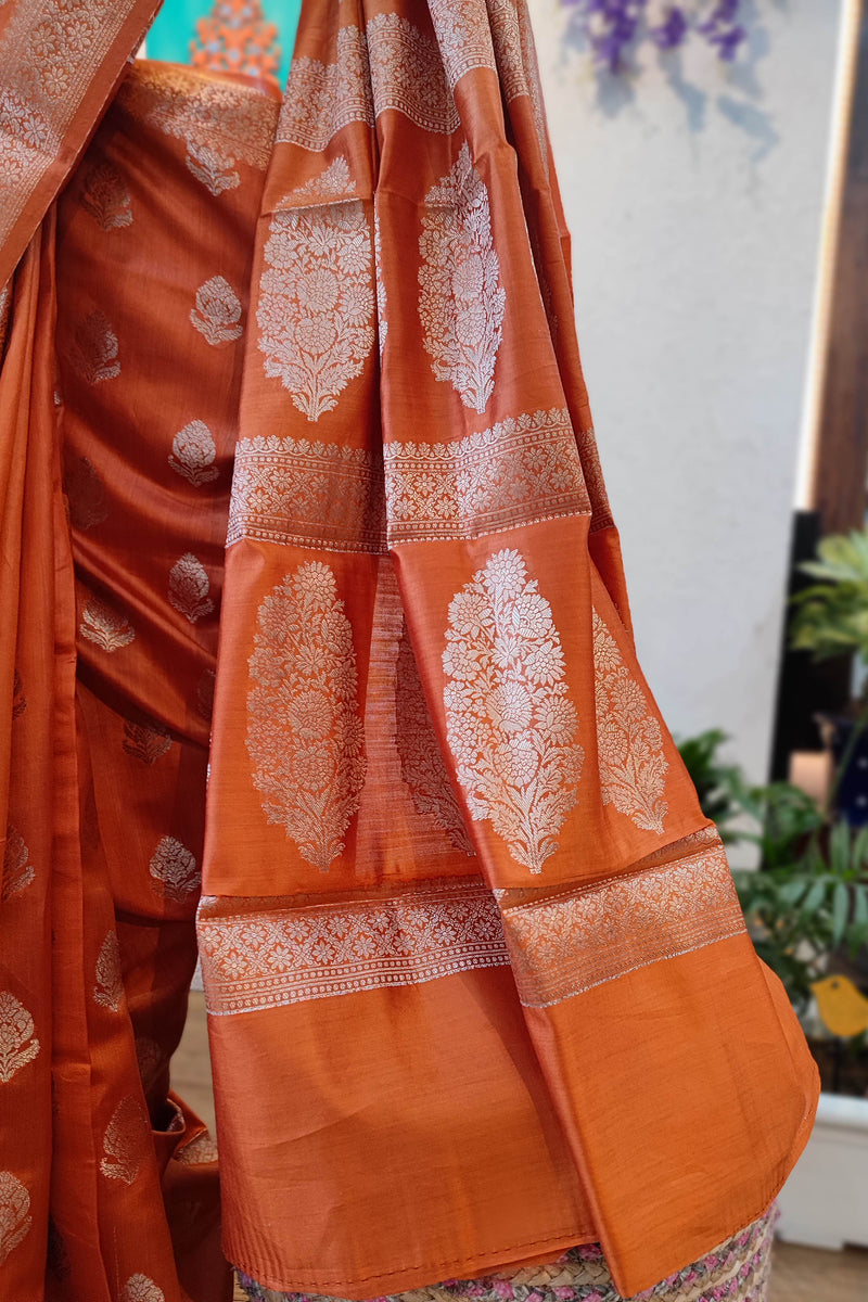 Rust Orange Banarasi Silk Saree with Zari Butti & Floral Motif Pallu
