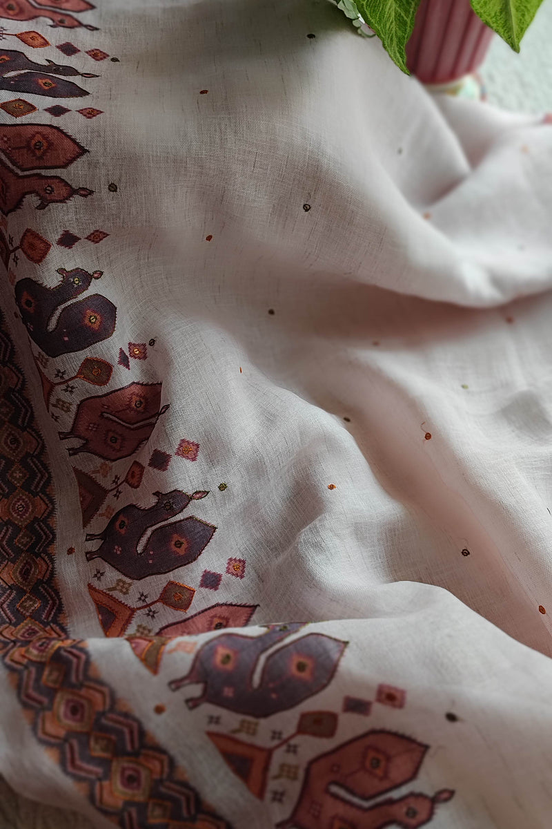 White Linen by Cotton Saree with Folk Print & Embellished Details