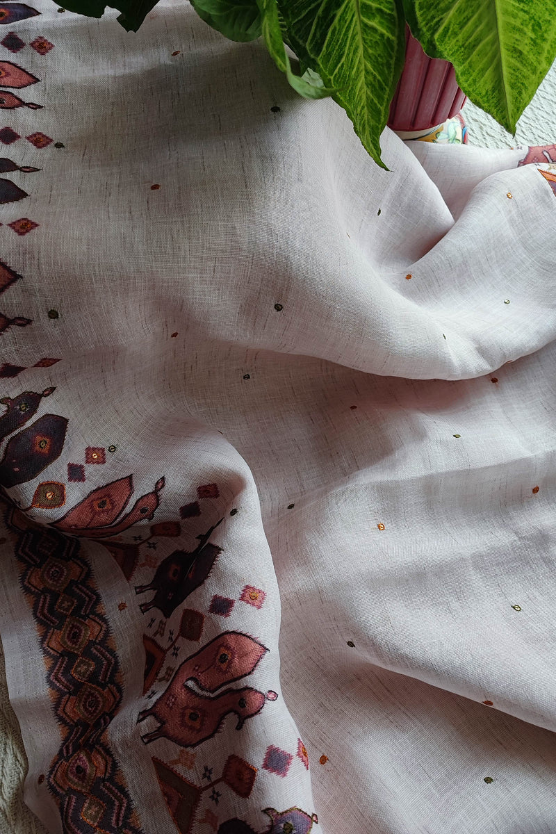 White Linen by Cotton Saree with Folk Print & Embellished Details