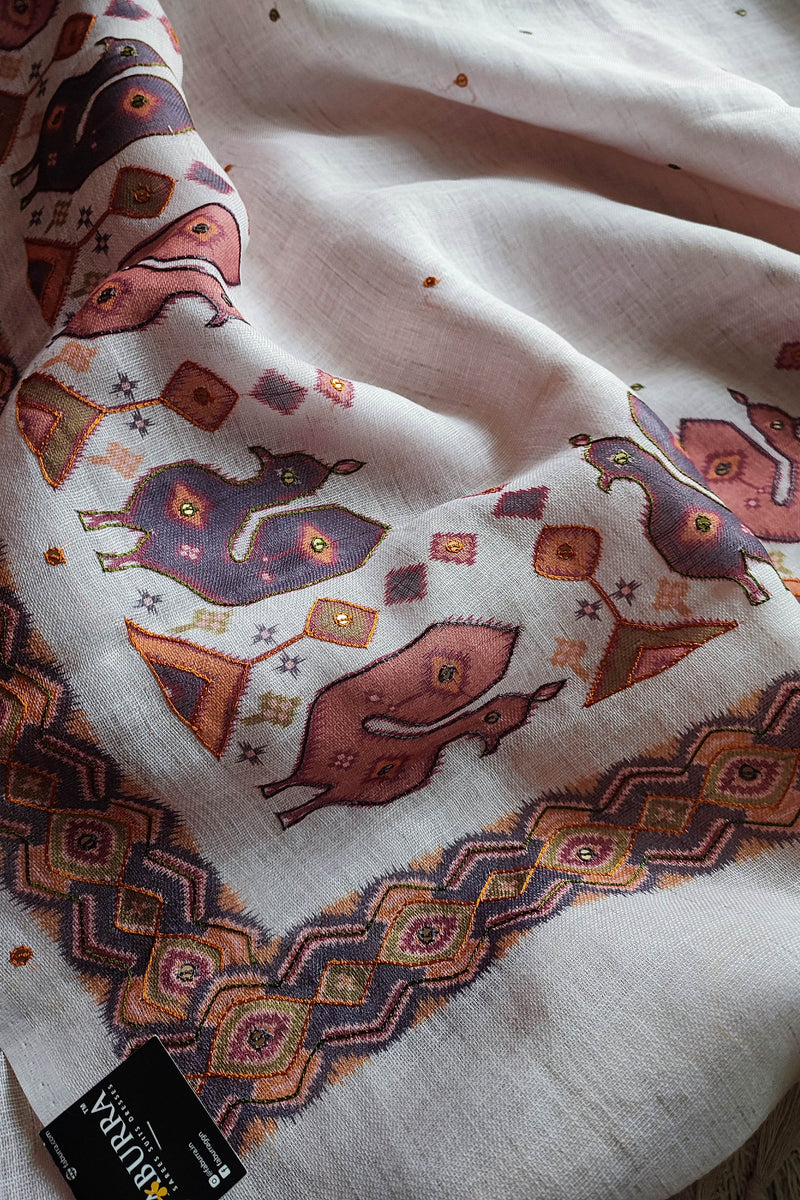 White Linen by Cotton Saree with Folk Print & Embellished Details