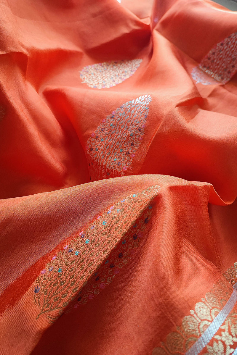 Coral Orange Crepe Silk Saree with Silver-Toned Woven Motifs