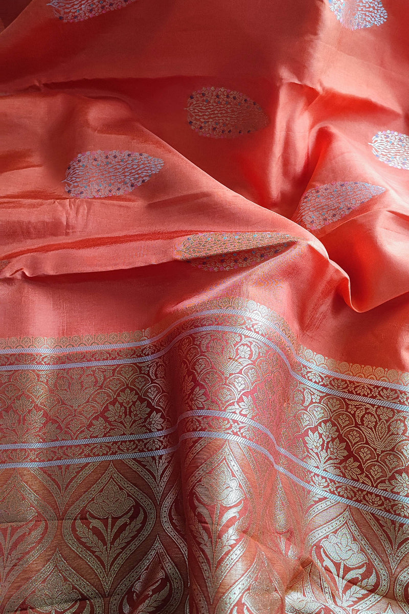 Coral Orange Crepe Silk Saree with Silver-Toned Woven Motifs