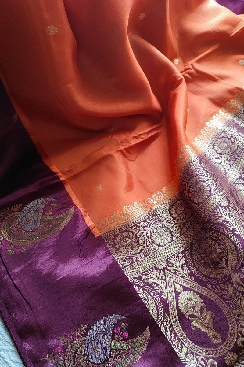 Orange Crepe Silk Saree with Purple Brocade Border & Golden Buti Motifs