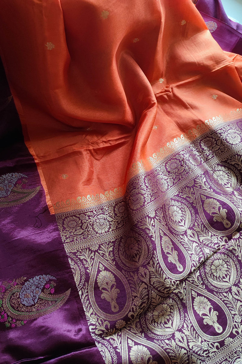 Orange Crepe Silk Saree with Purple Brocade Border & Golden Buti Motifs
