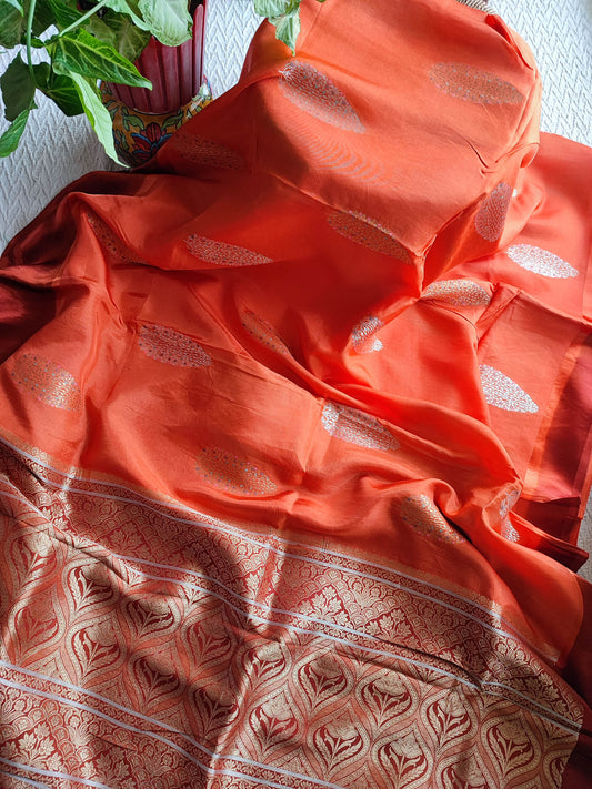 Peach Orange Crepe Silk Saree with Golden Motifs & Rich Brocade Border