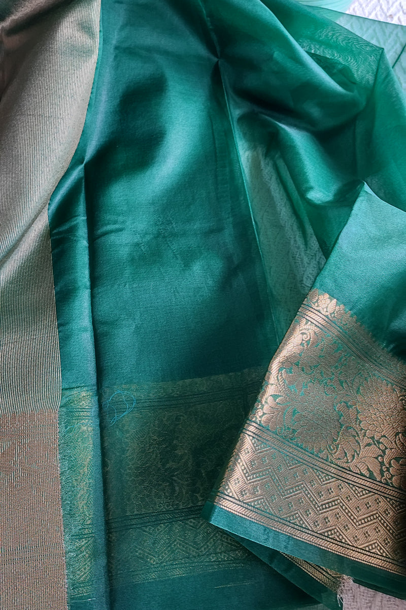 Emerald green Semi Organza Saree With Zari Border