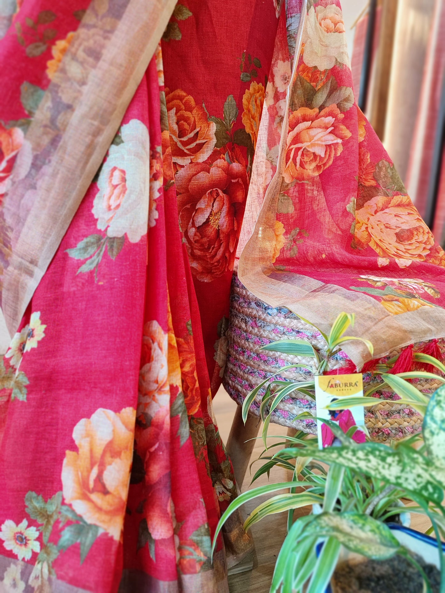 Rhubarb Red Linen Floral Printed Saree with Tassels Detailing