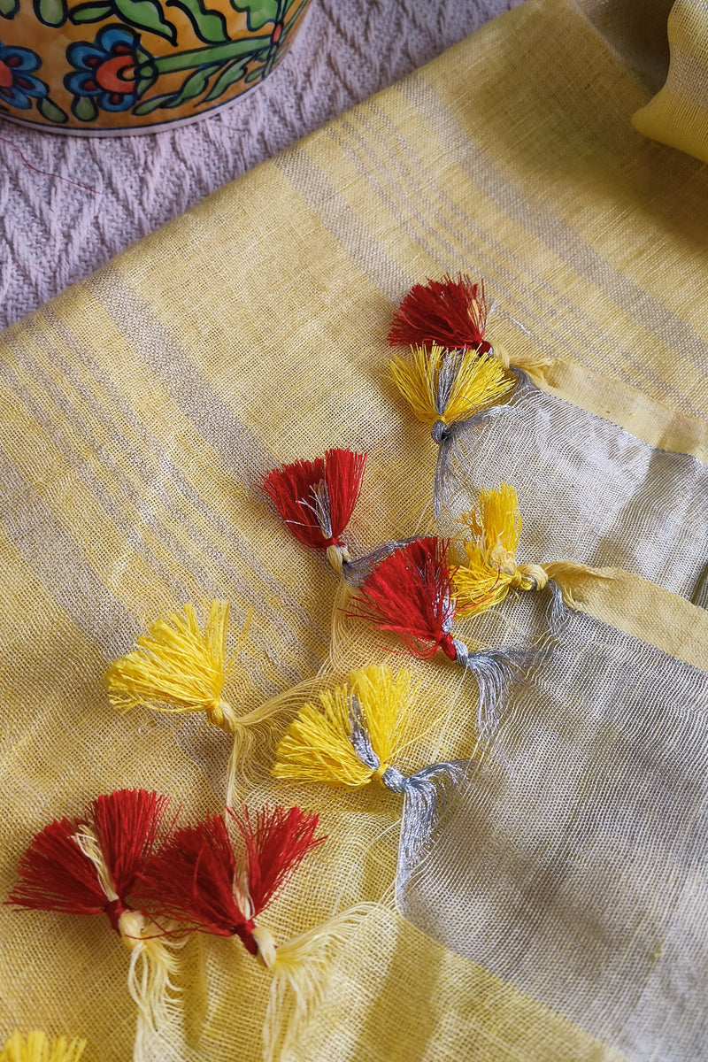 Pastel Yellow Pure Linen Embroidered Saree with Tassels Detailing