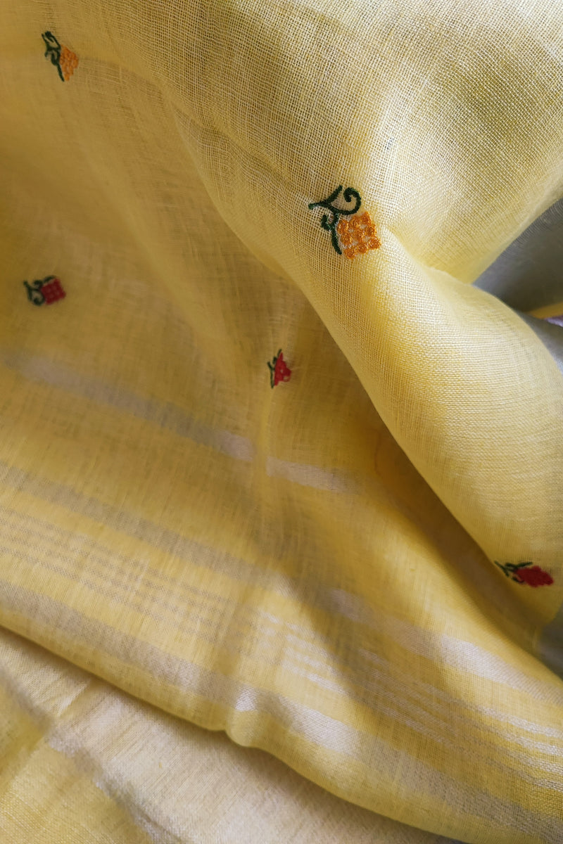 Pastel Yellow Pure Linen Embroidered Saree with Tassels Detailing